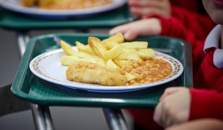 Fried nuggets and steamed desserts removed in England’s school meal overhaul